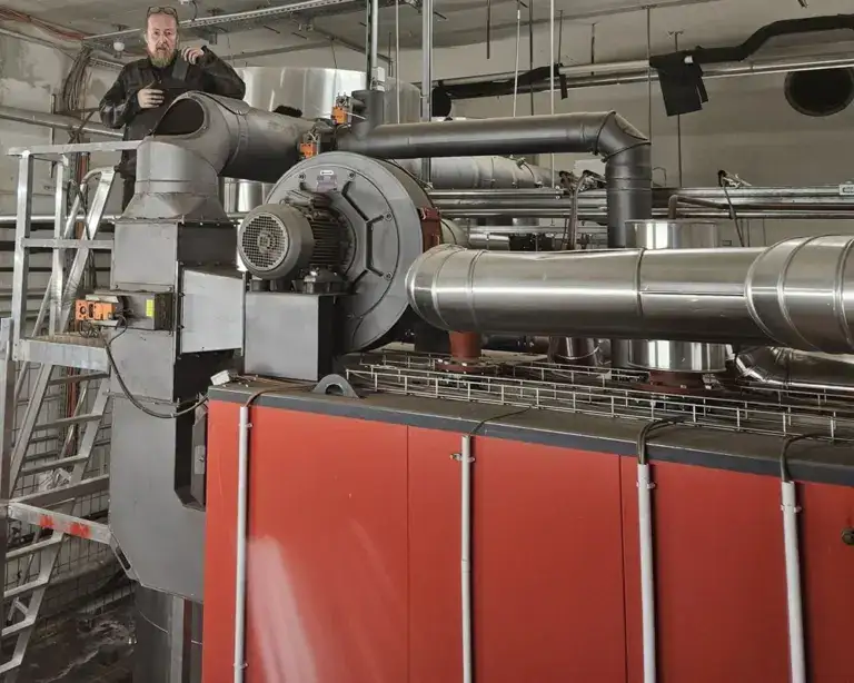 Rauchfangkehrer aus Villach in großem Heizraum